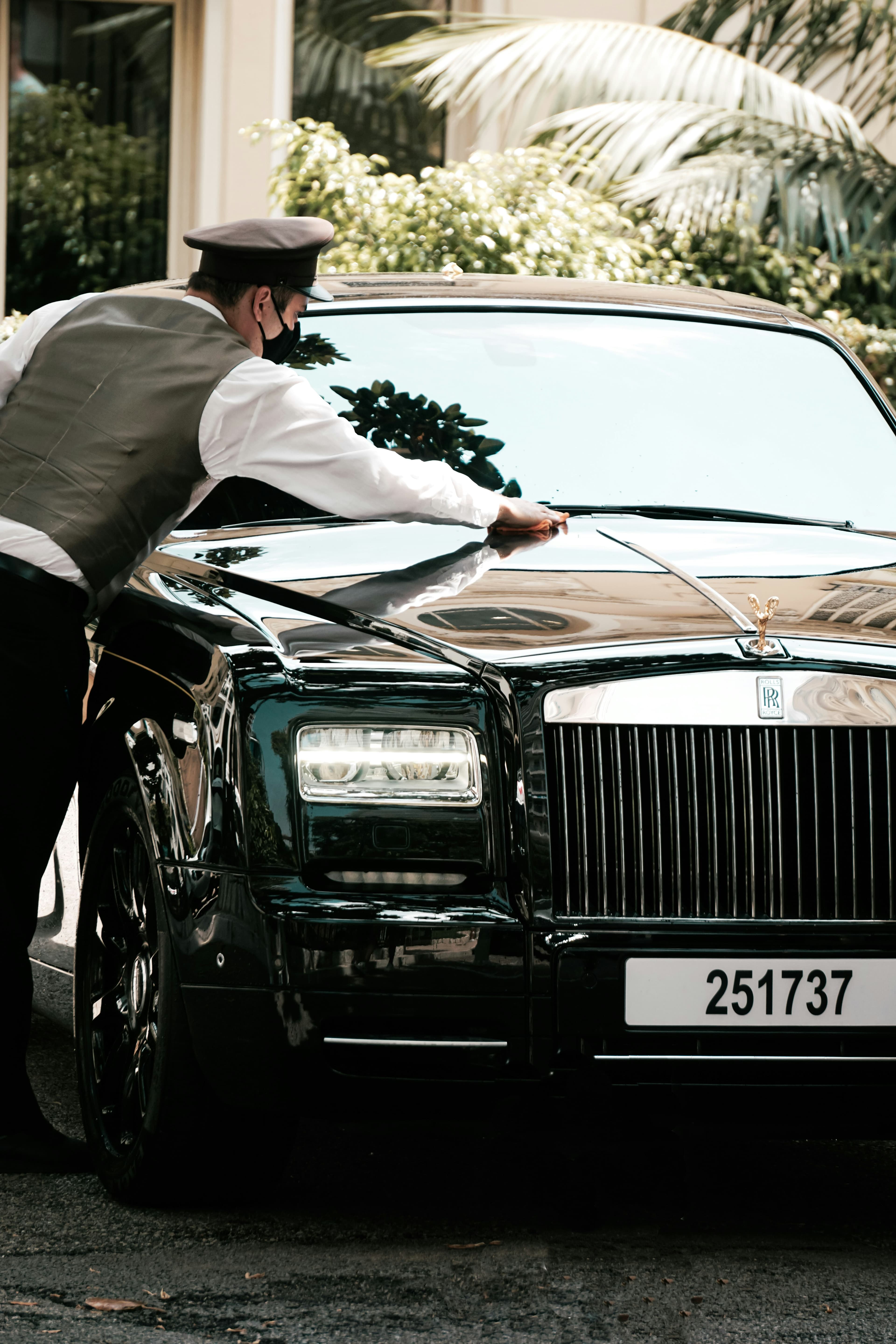 Professional chauffeur with Rolls-Royce