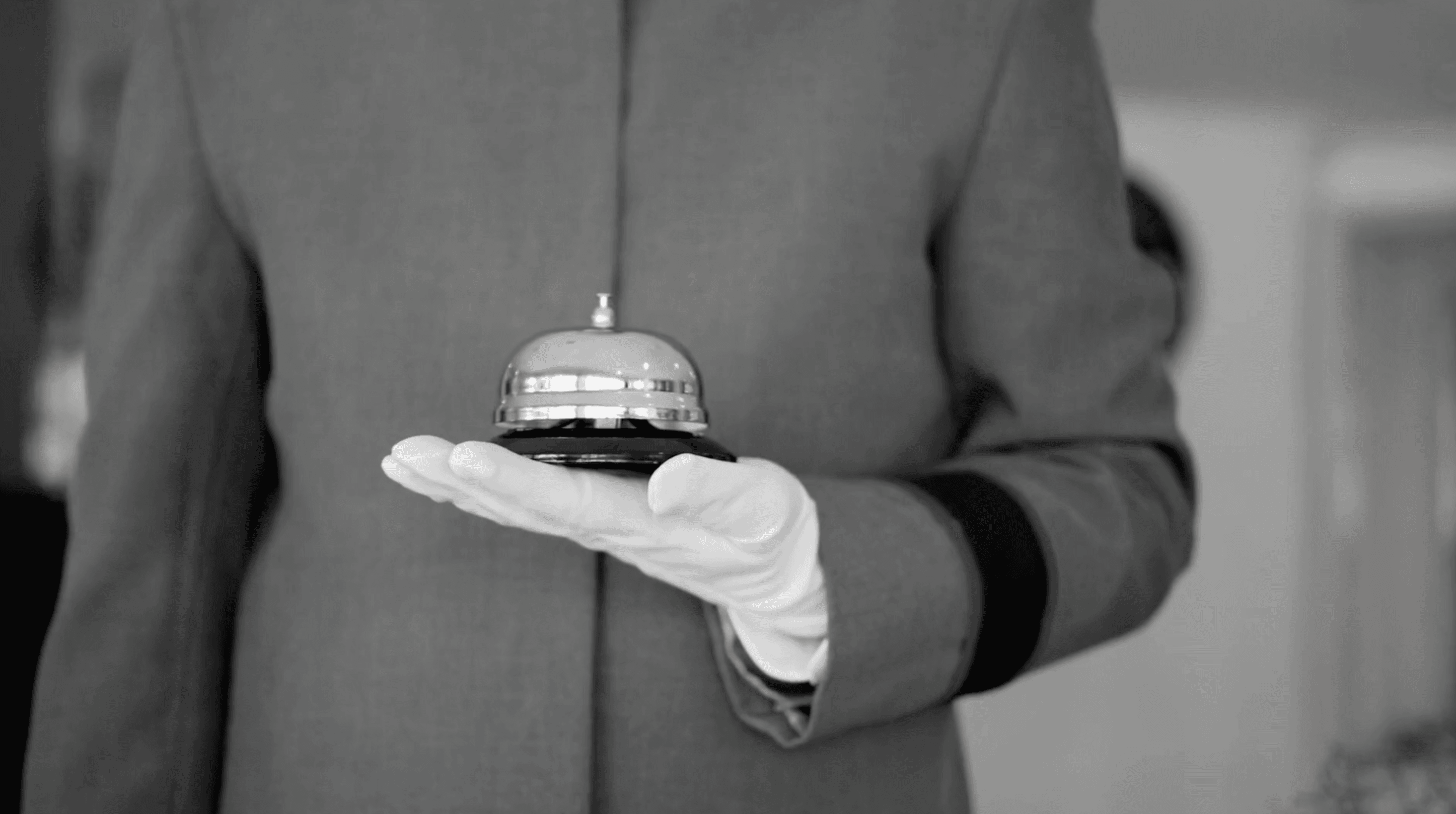 Butler providing impeccable service in an upscale setting